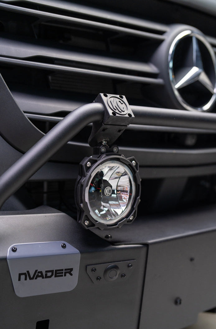 Offroad van bumper with KC fog light, close-up on Sprinter 4x4 adventure van mod