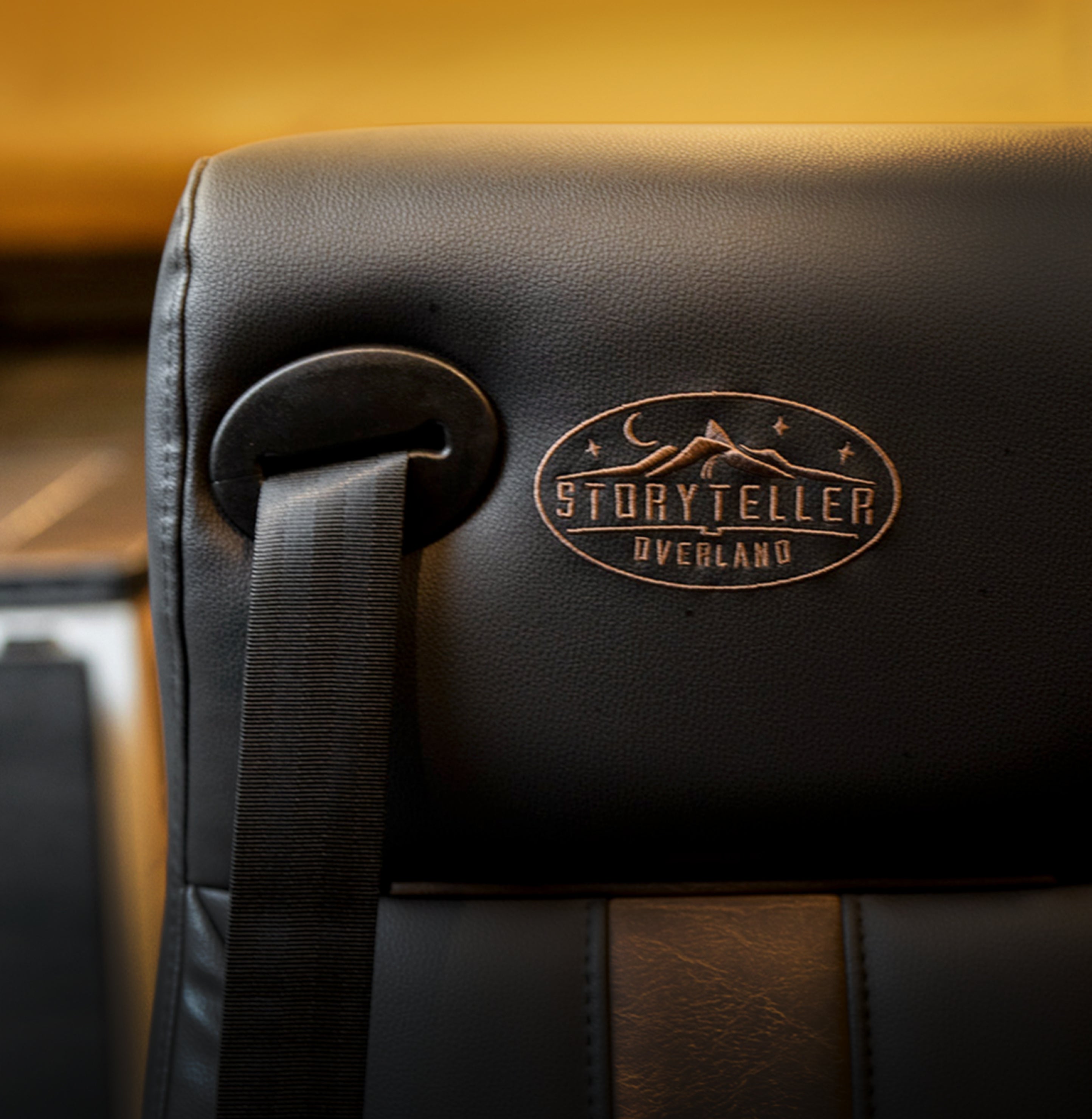 Premium leather seat with seatbelt in camper van, ideal for adventure van, overlanding, vanlife