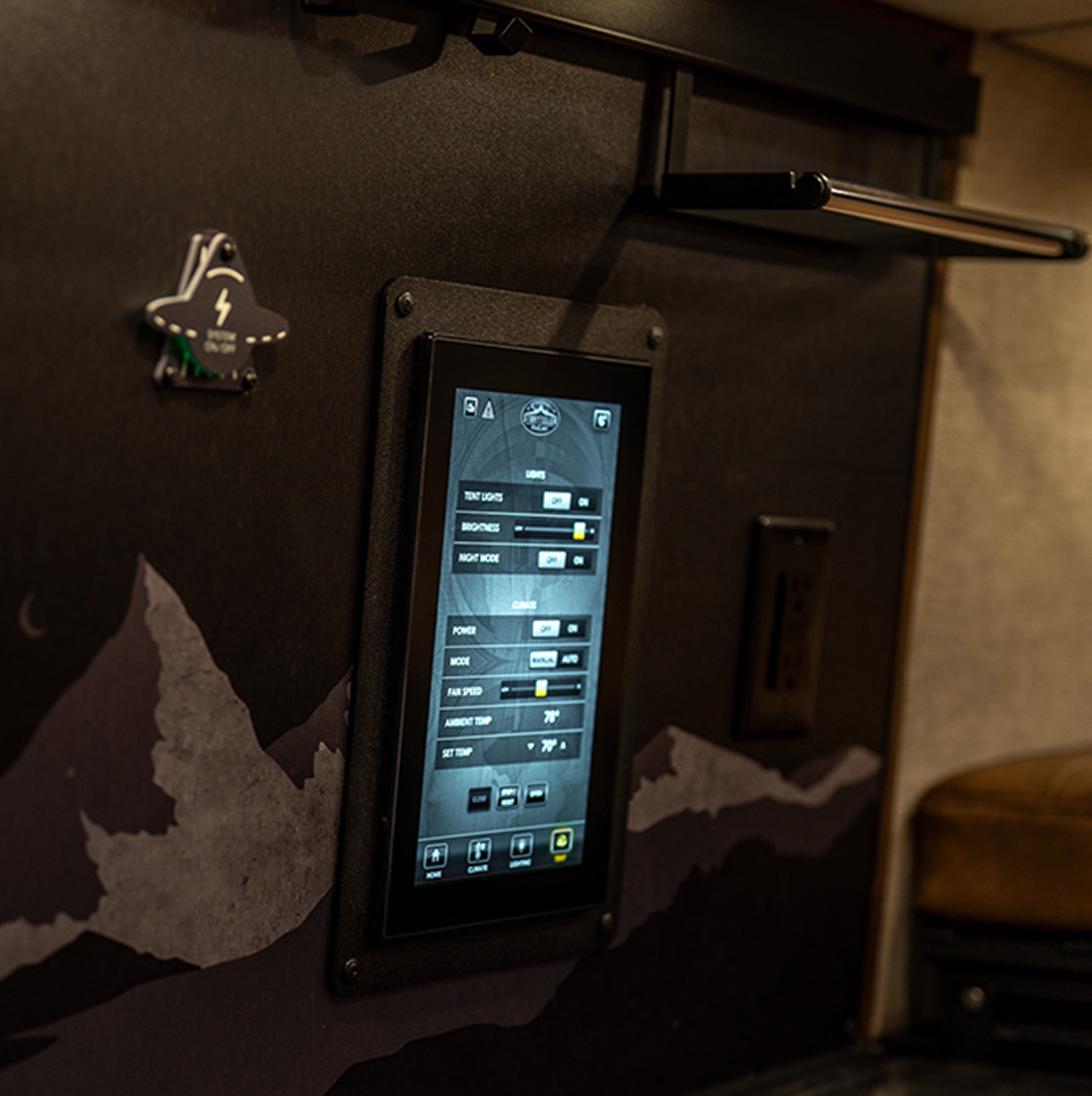 Interior digital control screen in adventure camper van for overlanding and van life