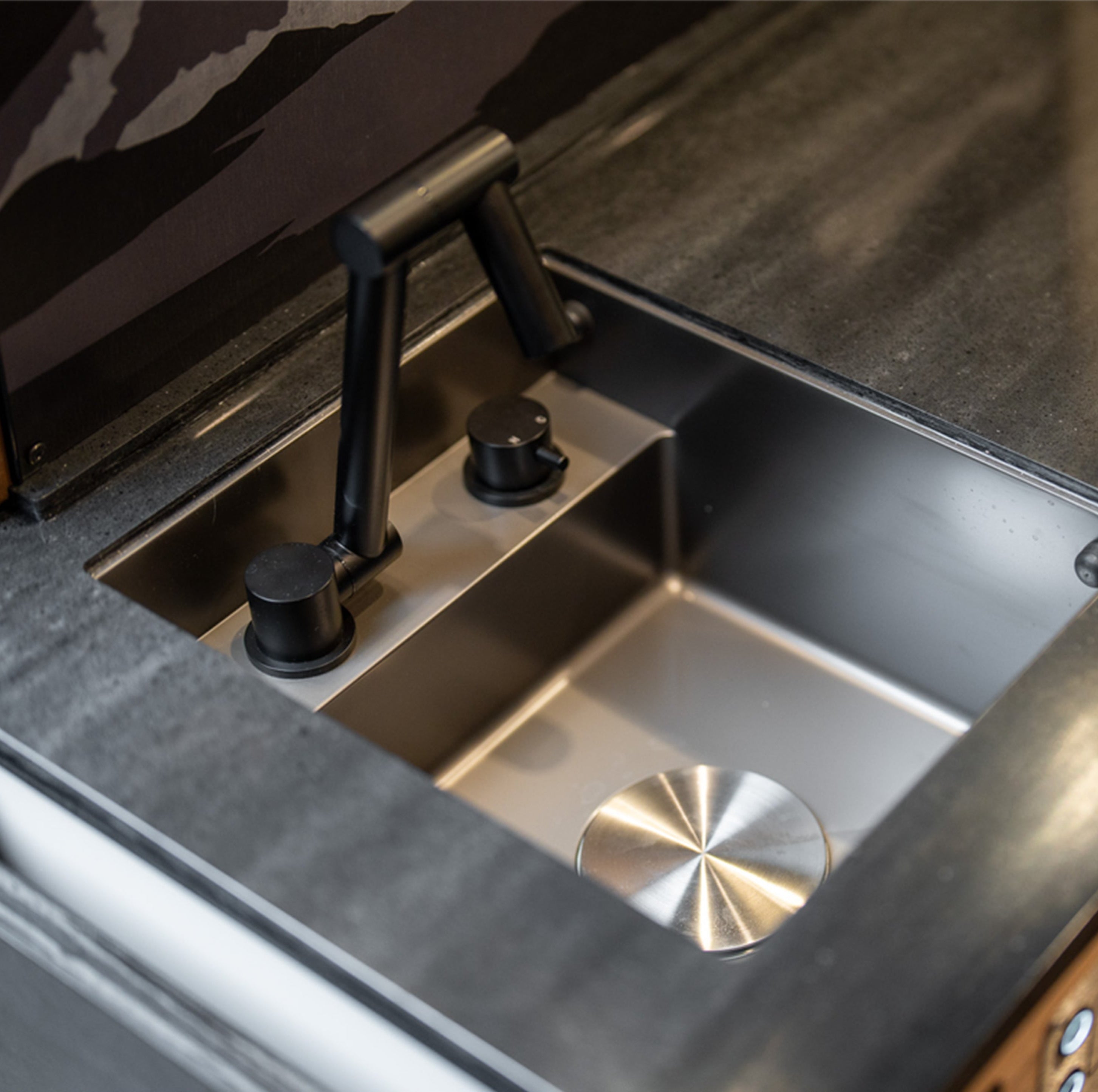 Modern sink in a camper van interior, ideal for adventure van or vanlife conversion.