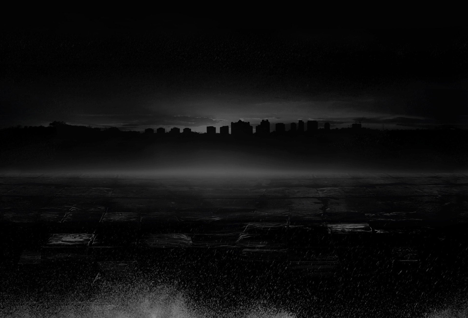 Dark urban skyline background, moody setting for adventure van, camper van, overland vehicle themes.