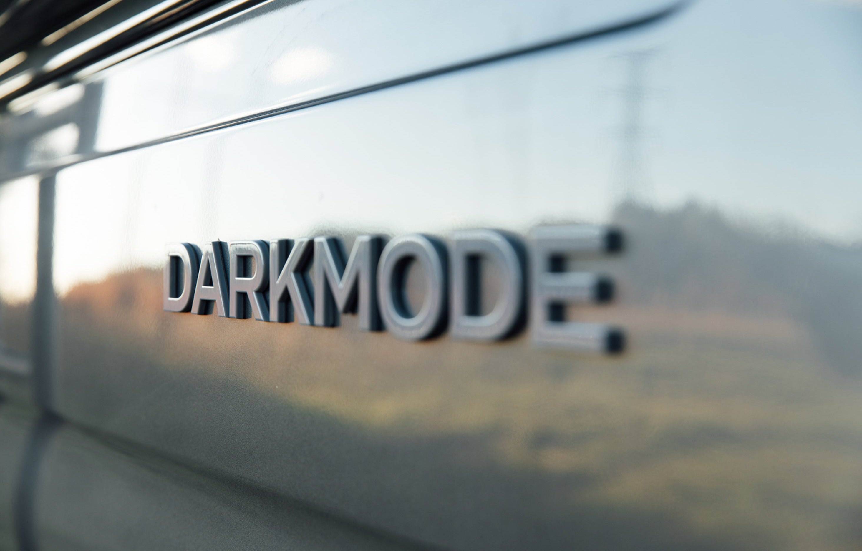 DARKMODE emblem on campervan exterior, adventure van, overland, vanlife, Class B RV