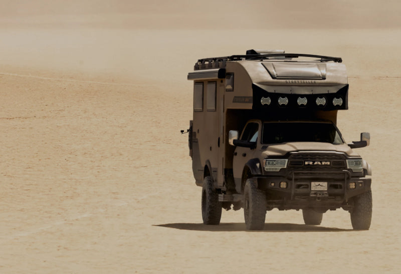 Expedition vehicle offroad in desert, adventure rig, overlanding, camper van, nomadic lifestyle