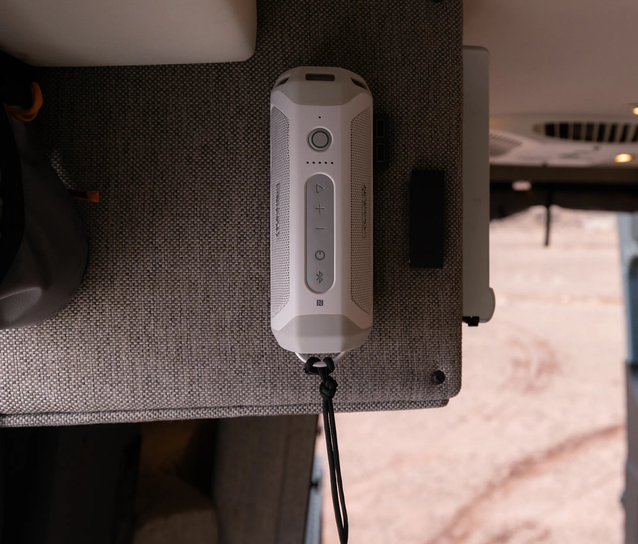 Compact interior control panel in a camper van, ideal for overlanding and van life adventures.