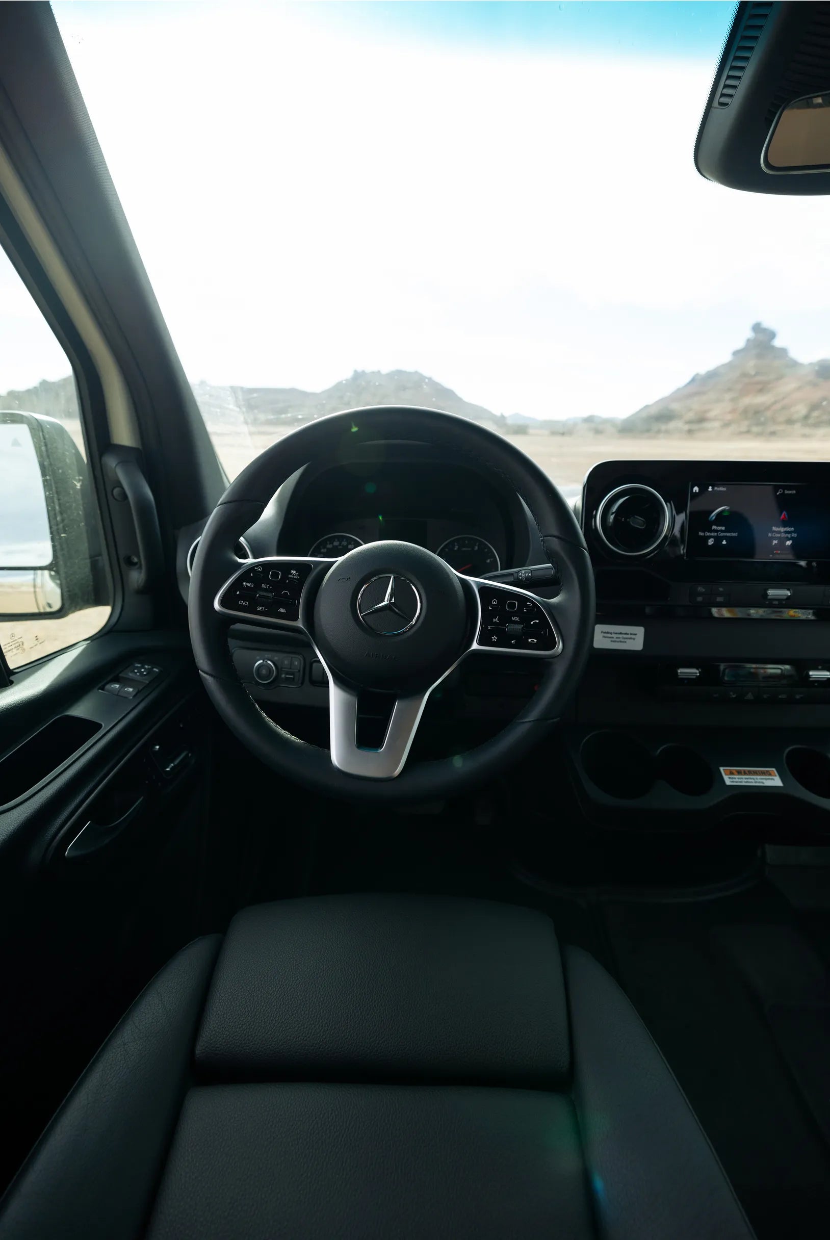 Modern Sprinter Van dashboard interior, ideal for camper van, overlanding, vanlife, adventure travel.