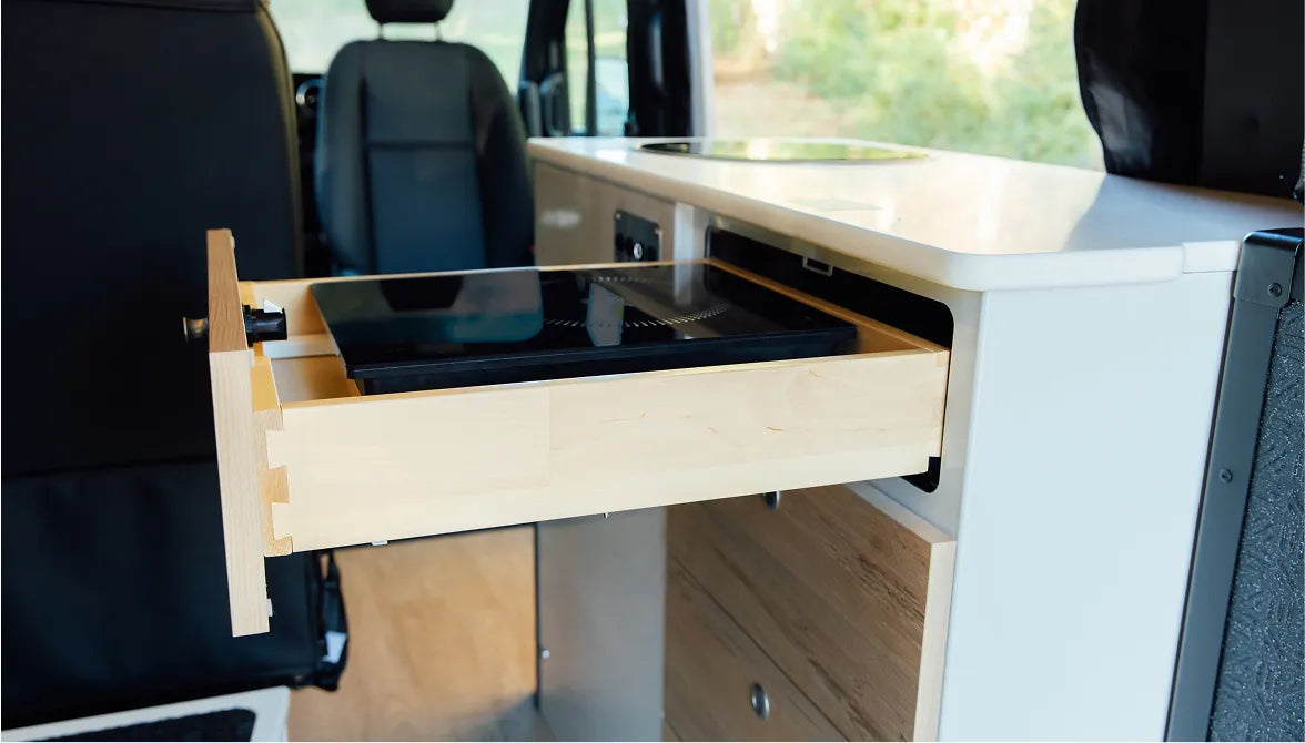 Interior drawer with built-in stove in adventure van campervan kitchen for vanlife travel