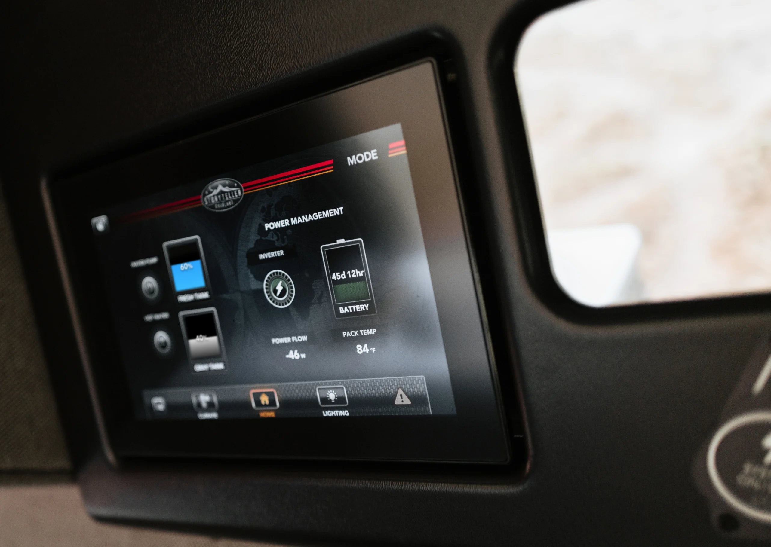 Camper van digital control panel showing power management in modern adventure van interior