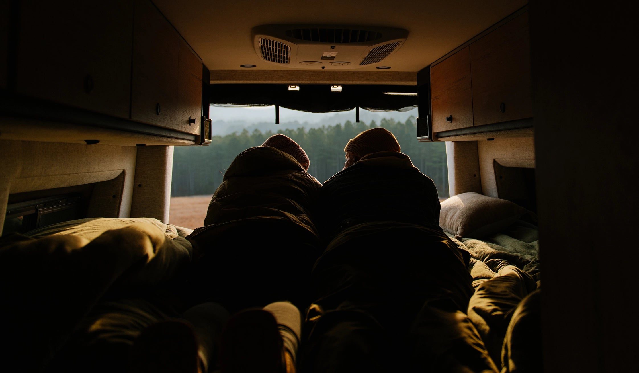 Storyteller Overland, Camper Van, Campervan, Adventure Van, Class B RV, Small Motorhome, Overland, Overlanding, Offroad Vehicle, Vanlife, Van life, TOUR MODE Bed View