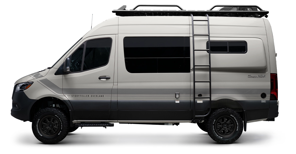 Gray Classic MODE 4x4 Sprinter camper van side view with offroad tires and roof rack