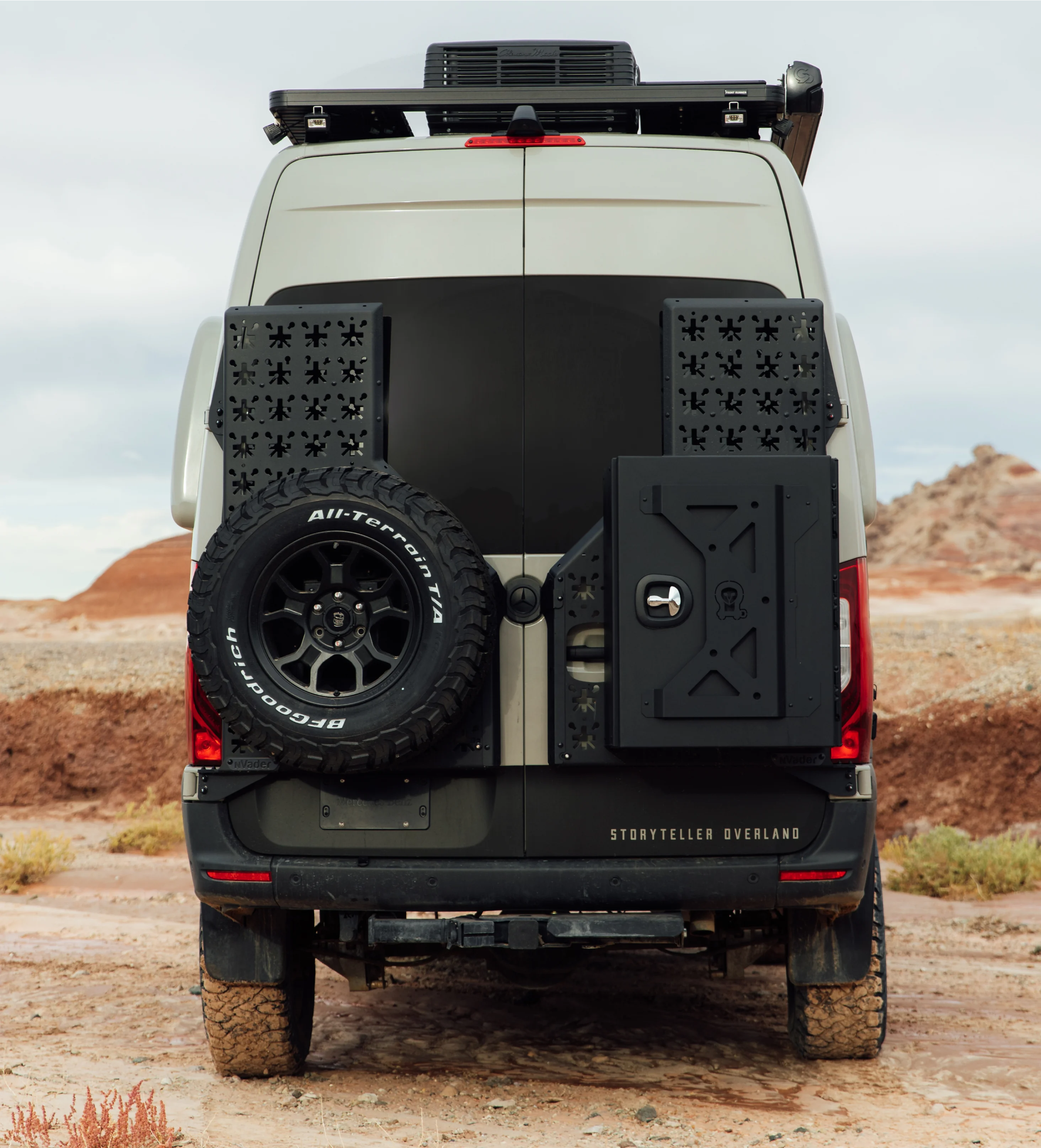 Rear view of offroad adventure rig Beast MODE 4x4 camper van in desert setting