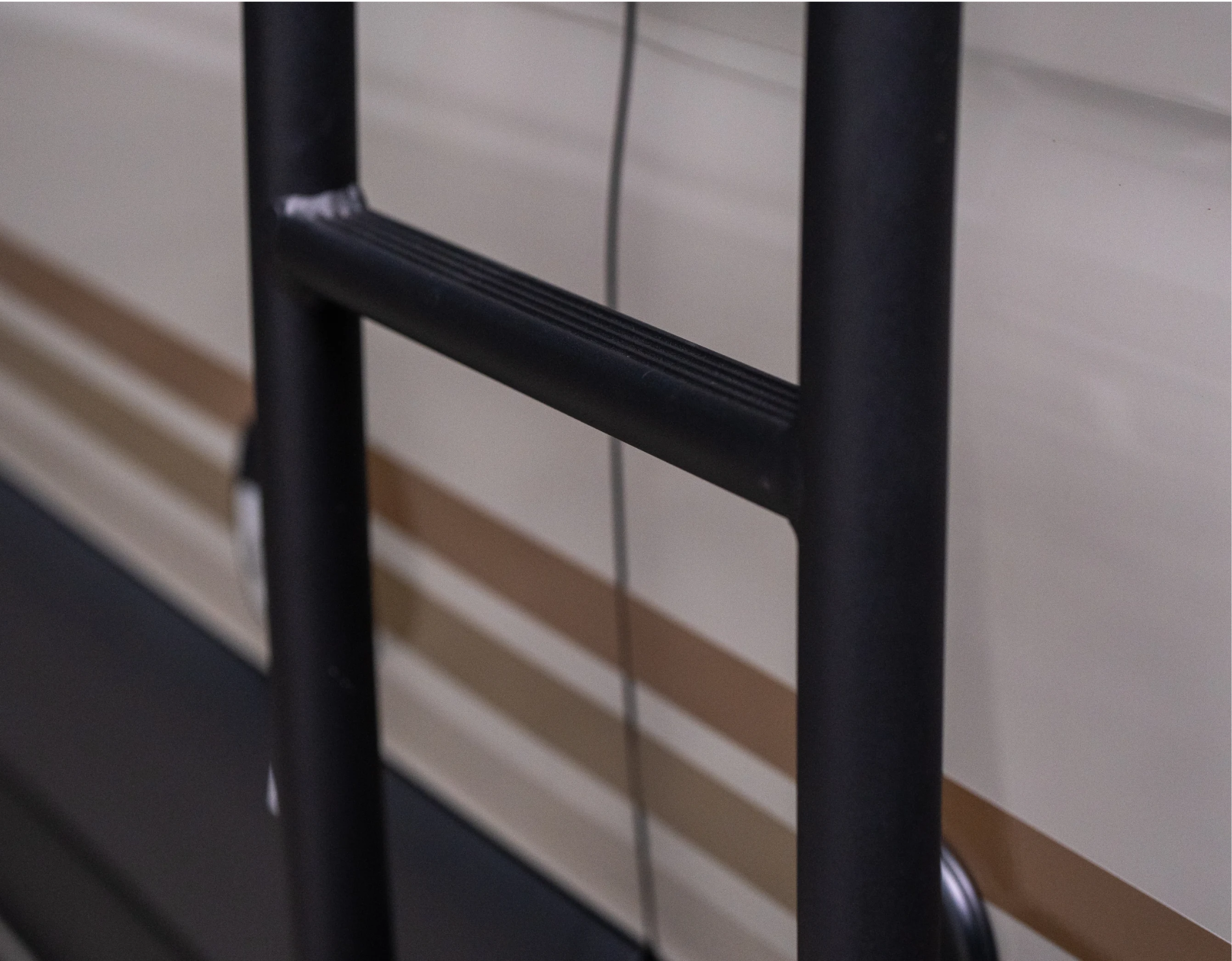 Close-up of black exterior ladder on Beast MODE camper van, Overland adventure rig