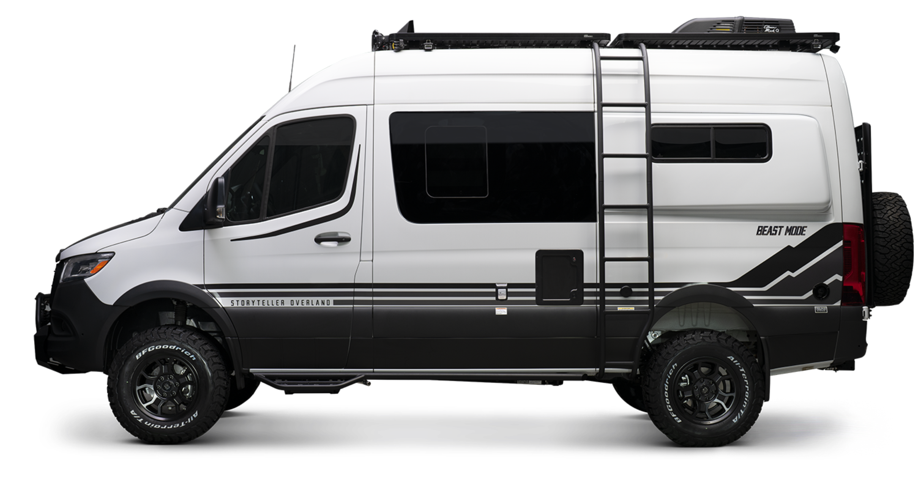 Side view of Beast MODE adventure van, rugged Sprinter 4x4 campervan with offroad tires and roof rack.