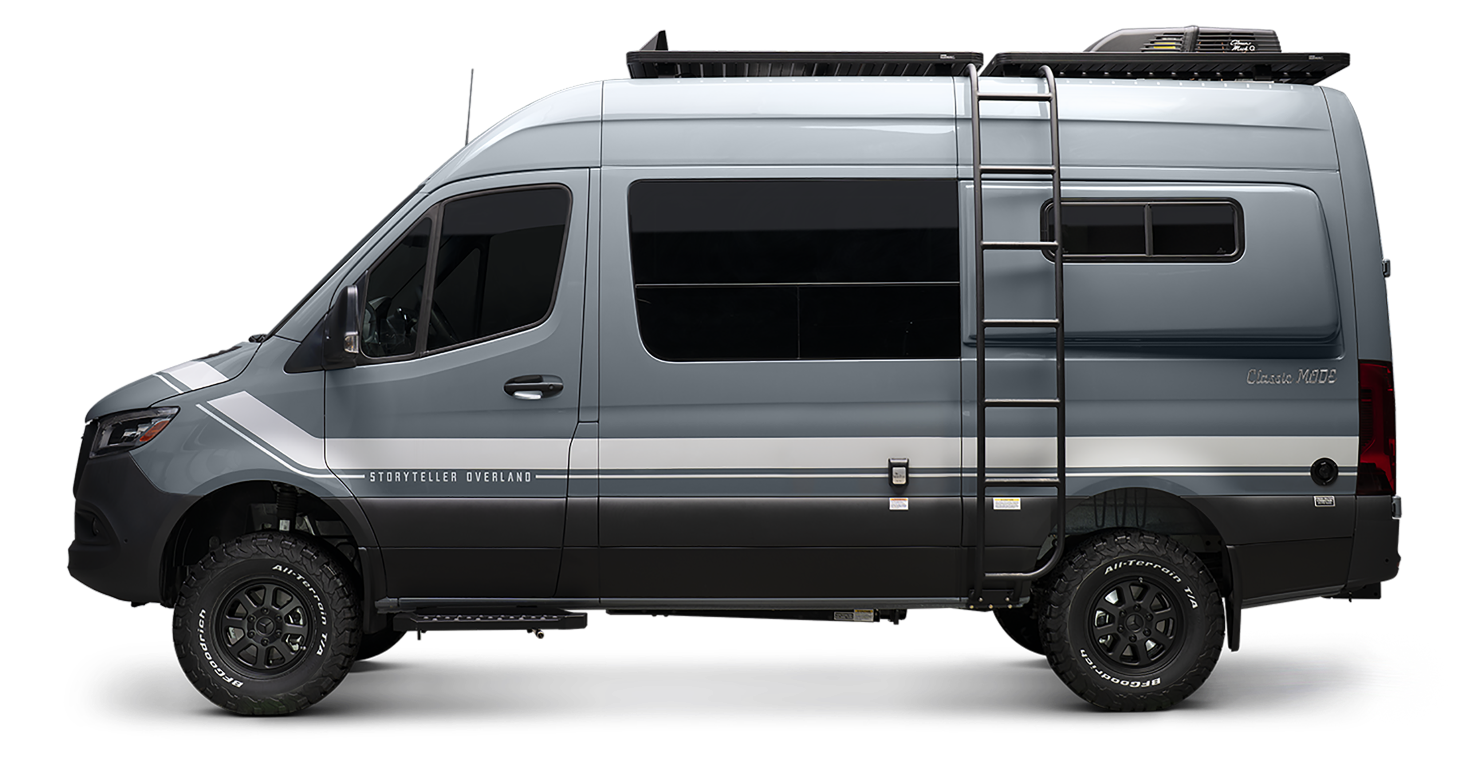 Side view of gray Classic MODE 4x4 Sprinter campervan with offroad tires and roof rack, ideal for vanlife, overland adventure, and road trips.