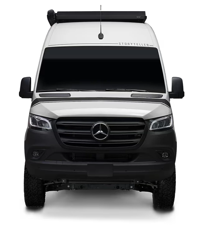 Front view of a white Sprinter 4x4 Camper Van ideal for overland adventure travel and vanlife.