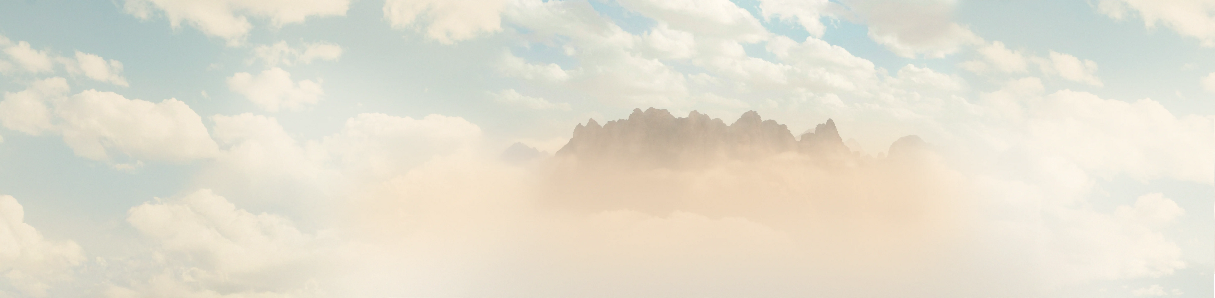Cloudy mountain landscape, ideal for overlanding and adventure travel backgrounds