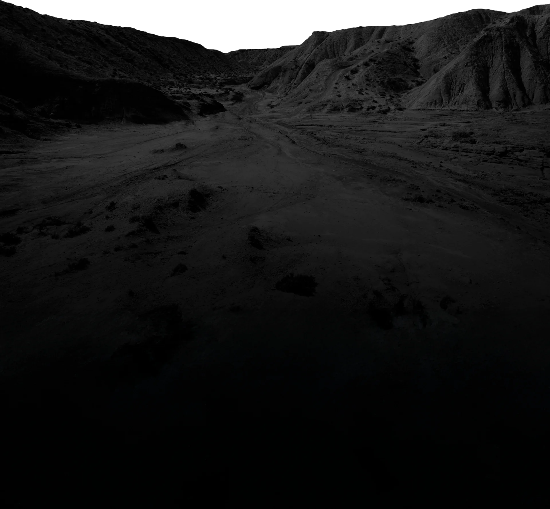 Rugged offroad terrain with rocky hills, perfect for Overlanding, Camper Van, and Adventure Van travel