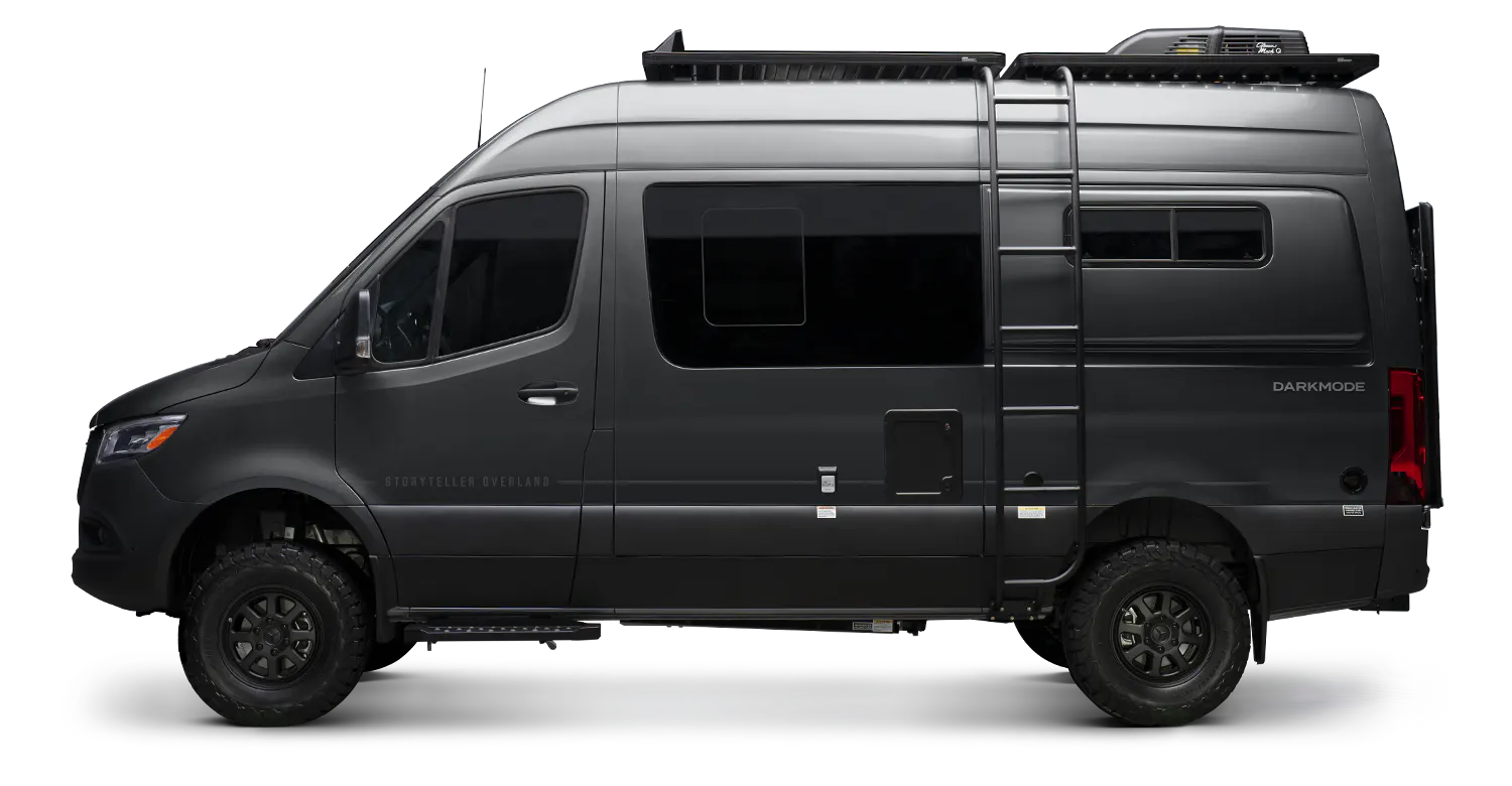 Selenite Grey Sprinter 4x4 camper van with offroad wheels, ladder, and roof rack, ideal for overlanding and adventure travel.