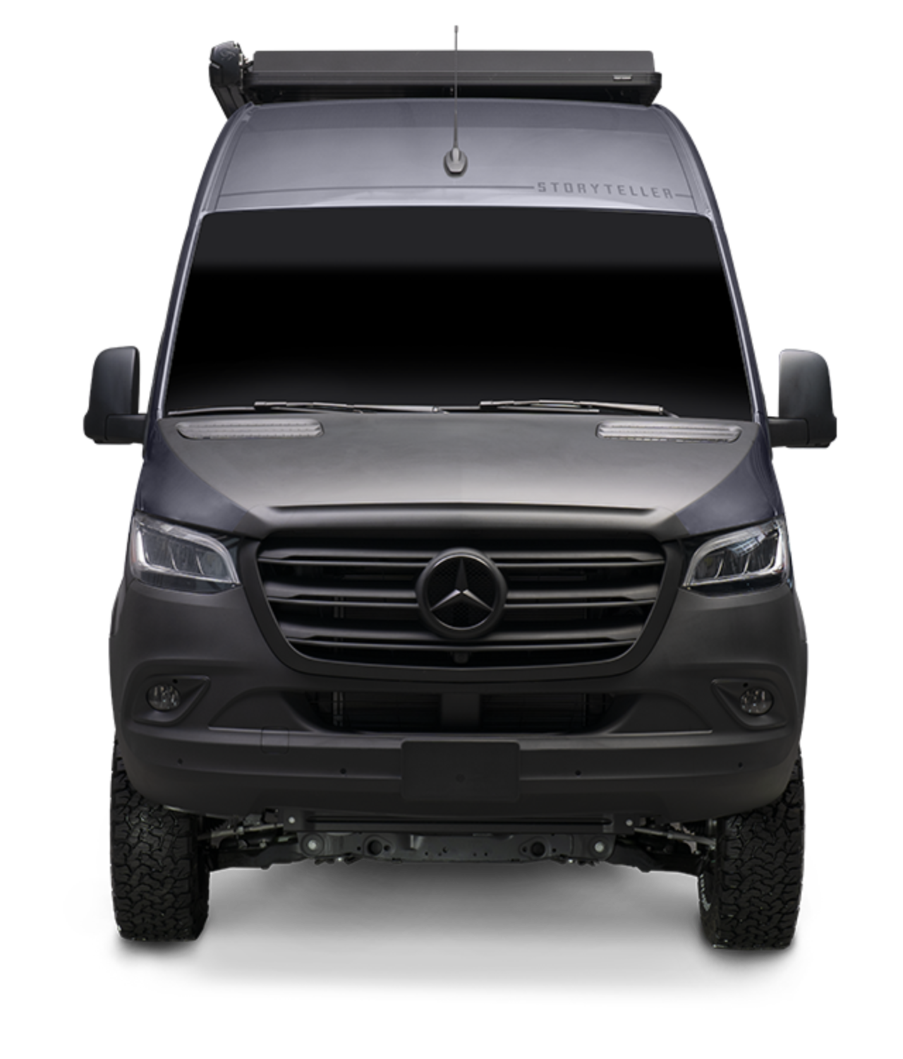 Front view of lifted dark Mercedes Sprinter 4x4 camper van, overland adventure rig