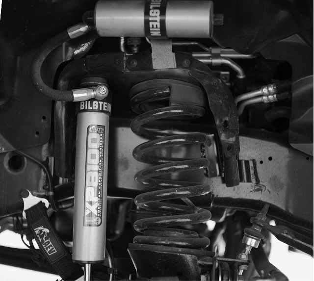 Close-up of Bilstein suspension system on GXV Overland vehicle